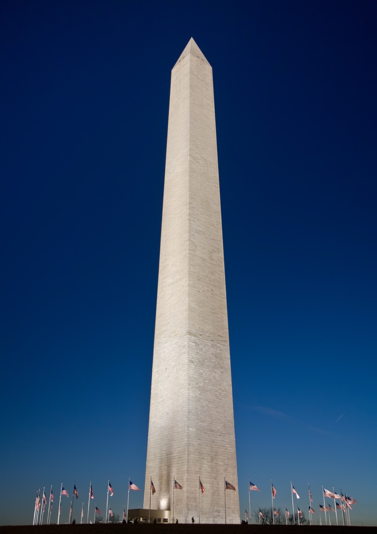 The Washington Monument against a deep blue sky